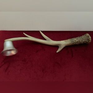 Candle Snuffer made of resin antlers and metal snuffer.